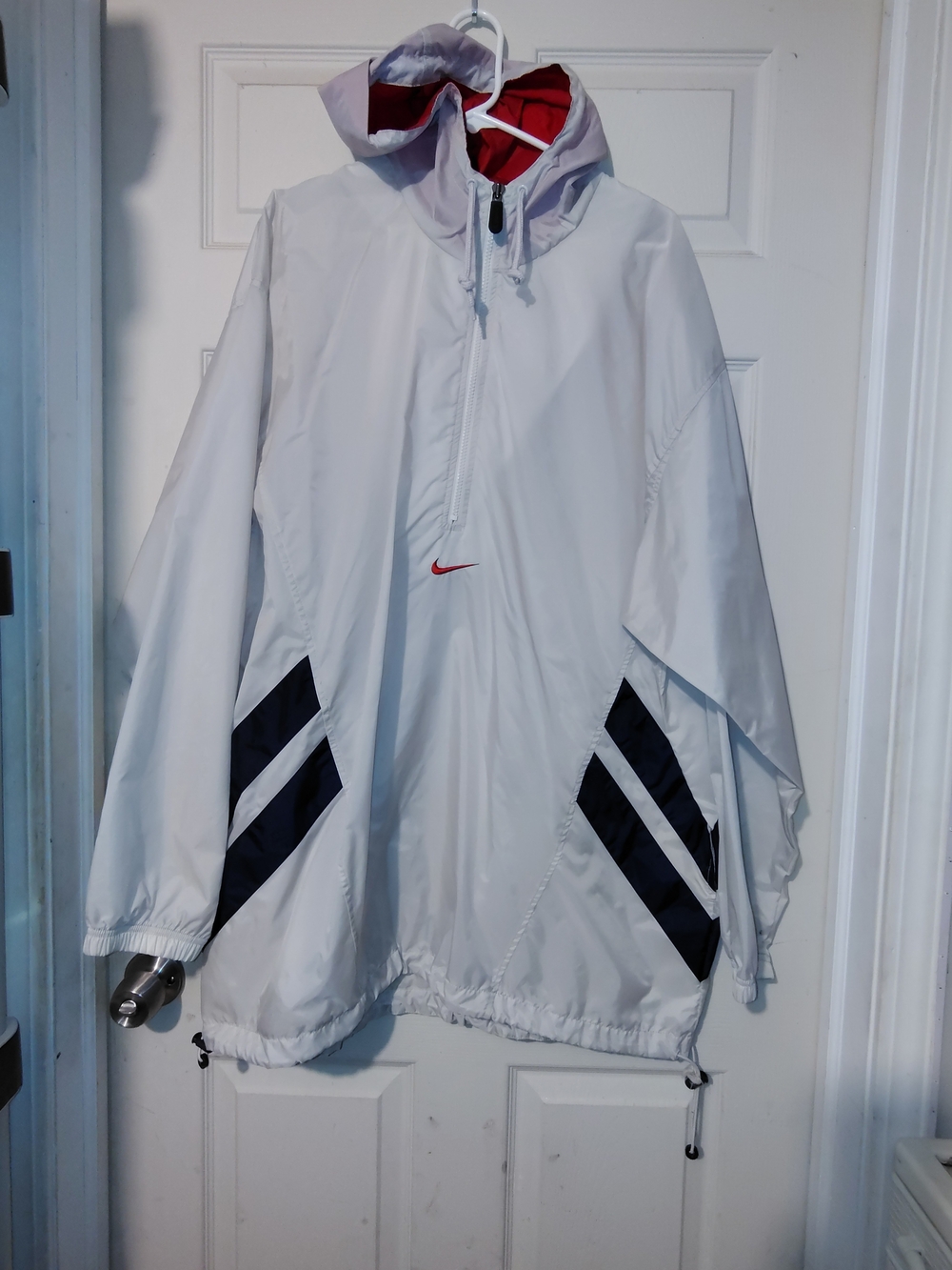 Nike White Hooded Rain Pullover with Red Lining and Black Chevron Accents